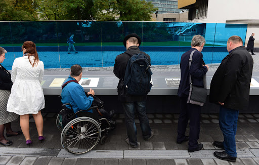 GERMANY, Berlin : Visitors read about the memorial to the victims of the Nazis&#8217; &#8220;euthanasia&#8221; programme