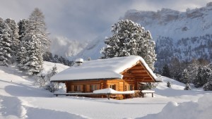 web-cabin-cozy-winter-snow-squarciomomo-shutterstock_66785776