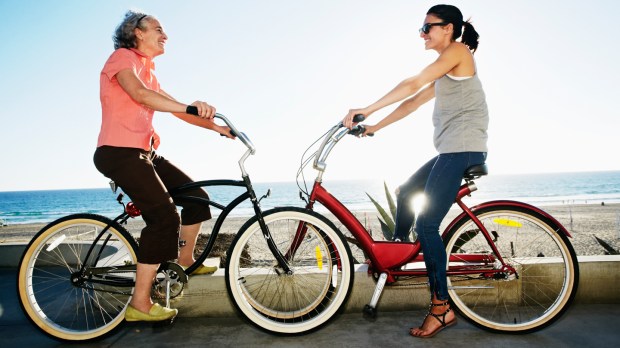 web-women-bike-sun-seaside-c2a9-peathegee-inc-getty.jpg