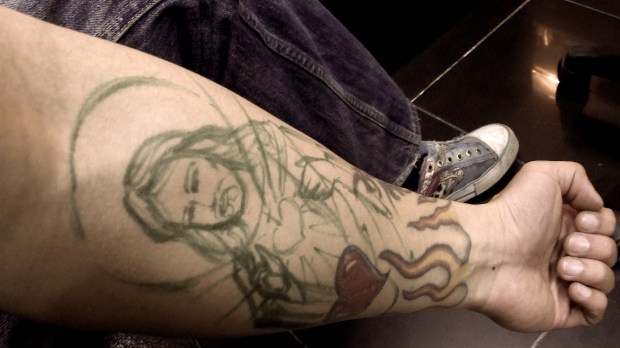 web-tattoo-guy-arm-jesus-carlos-varela-cc