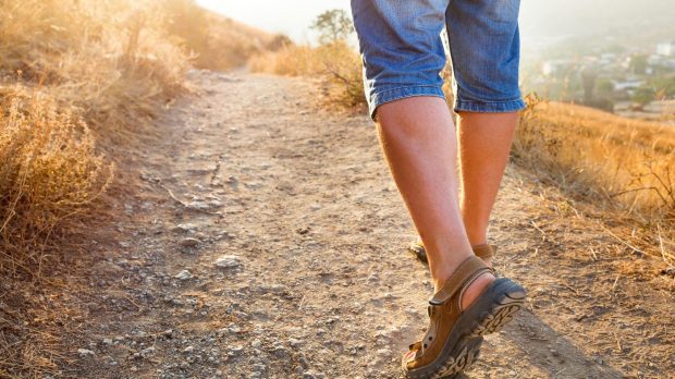 hero-man-sandals-walking-away-Konstantin-Aksenov-shutterstock_325579022