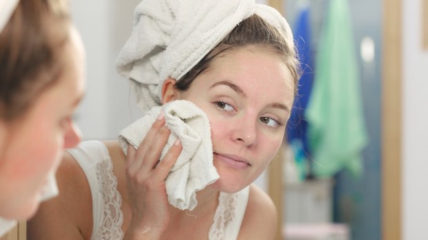 WEB3 WOMAN BATHROOM SHOWER FACE WASH SKIN CARE Shutterstock