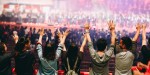young praying raised hand