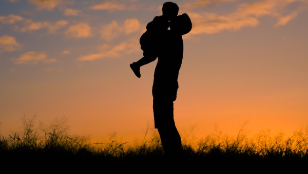 FATHER PICKS UP SON,
