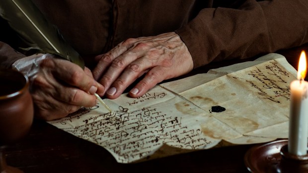 WEB3-MONK-WRITE-MEDIEVAL-FEATHER-PEN-WRITE-OLD-SHUTTERSTOCK.jpg