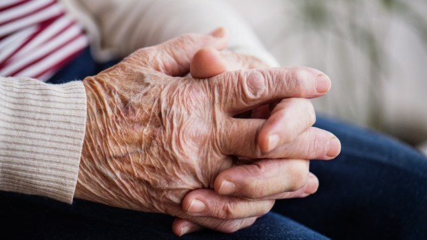 OLD-PERSON-PRAY-HAND-shutterstock_1049228039.jpg