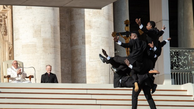 Pope Francis watches artists of the Kenyan Circus performing during his weekly general audience