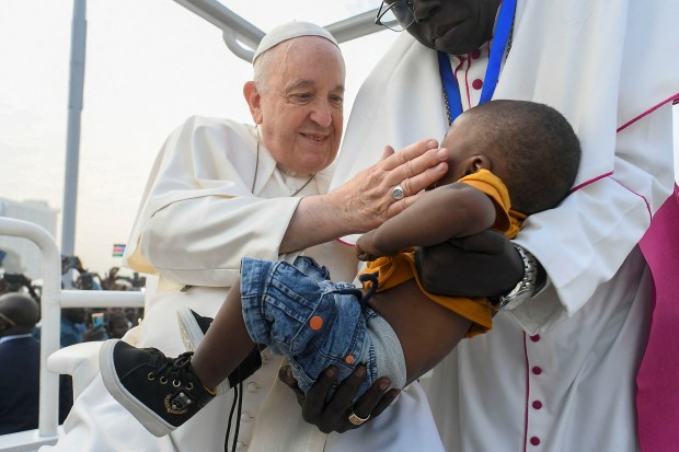 Pope-Francis-blessing-a-child-during-the-holy-mass-at-the-John-Garang-Mausoleum-in-Juba-South-Sudan-AFP