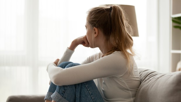 WOMAN-SAD-BACK-shutterstock
